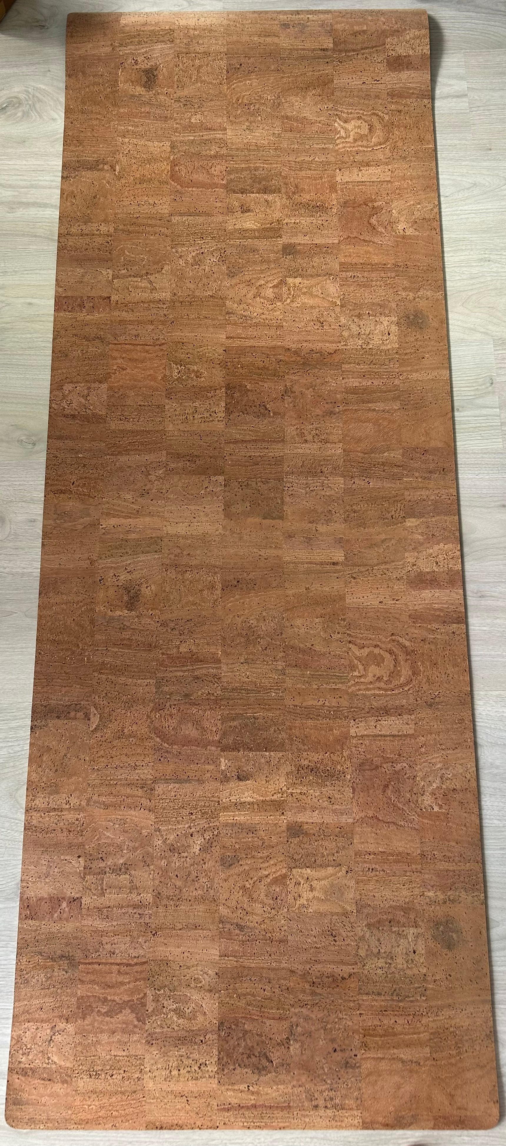 The Foundation Mat, flat. Cork surface.