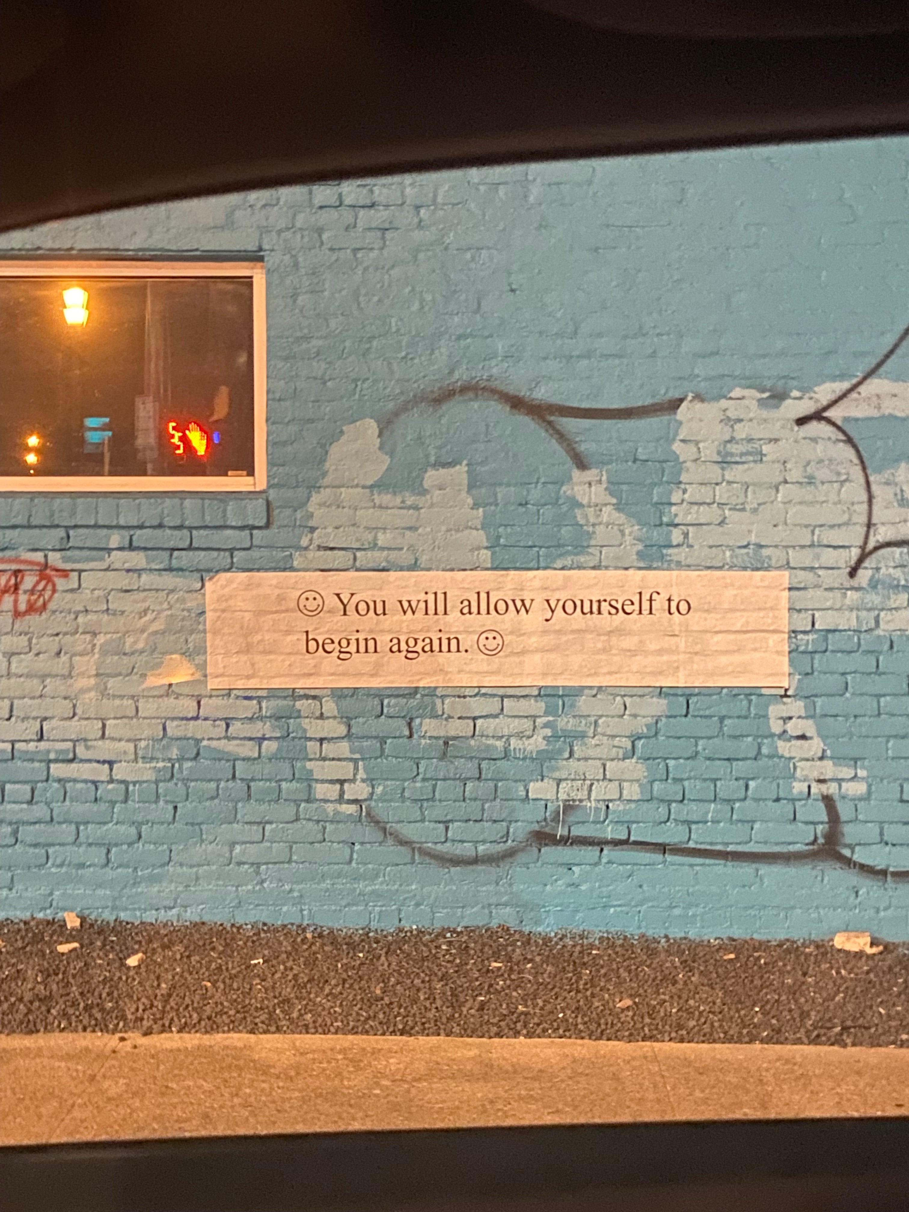 East 6th street art, Austin at night.
